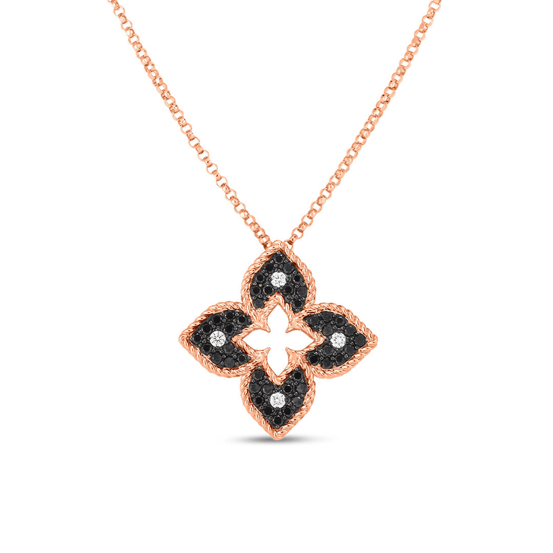 The Roberto Coin Petite Venetian Princess 18K Rose Gold Necklace showcases a floral pendant with black and white diamonds, displayed on a white background.