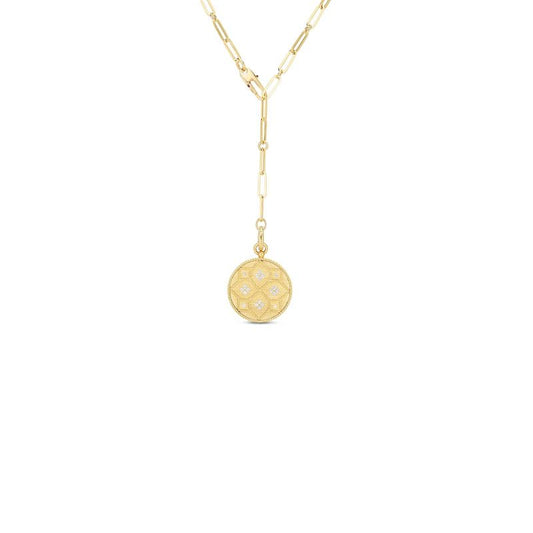 The Roberto Coin Venetian Princess necklace features a satin medallion pendant adorned with delicate diamond flower details, elegantly suspended on a link chain. This exquisite piece, crafted in 18K Yellow Gold, offers a timeless and sophisticated design reminiscent of a Venetian Princess Medallion.