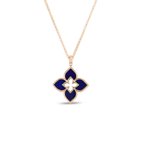 Roberto Coin Venetian Princess 18K Rosé Gold Necklace Pendant features a quatrefoil design with four dark blue enamel petals outlined in 18 Karat Rosé Gold, surrounding a white enamel clover shape.