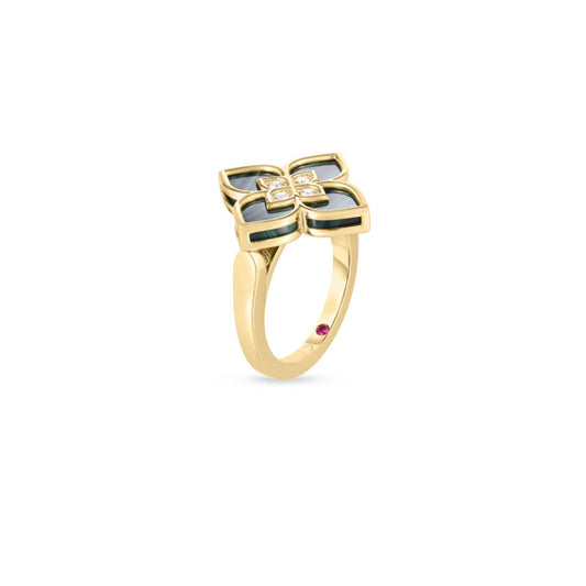 The captivating Roberto Coin Venetian Princess 18K Yellow Gold Malachite and Diamond Ring features a gold band with a floral top, green malachite petals, and small diamonds at its core. A contrasting small red gemstone completes the design, all beautifully set against a plain white background.