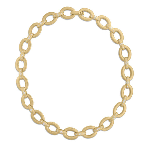 Introducing the Roberto Coin Duchessa Oval Link Collar Necklace, a captivating piece crafted from 18K yellow gold. This elegant necklace features oval links embellished with stunning diamond accents, seamlessly connecting to form a circle. The design is completed with a discreet clasp for an effortlessly sophisticated look.