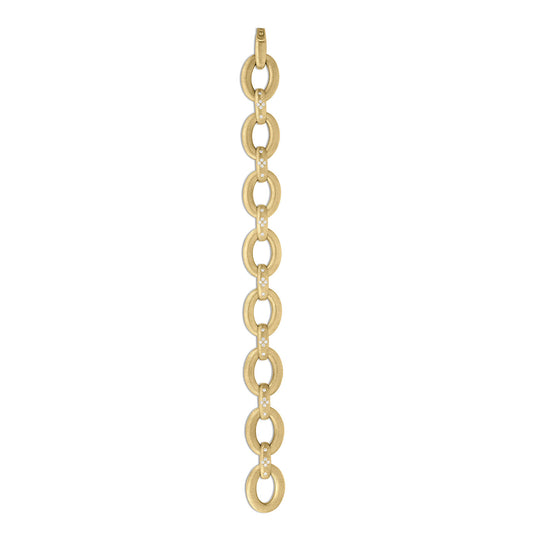 The Roberto Coin Duchessa 18K Yellow Gold and Diamond Accent Oval Link Bracelet showcases interlocking links in an elegant oval design, each embellished with a delicate diamond accent. The shimmering stones beautifully catch the light, while the bracelet secures effortlessly with a simple clasp.