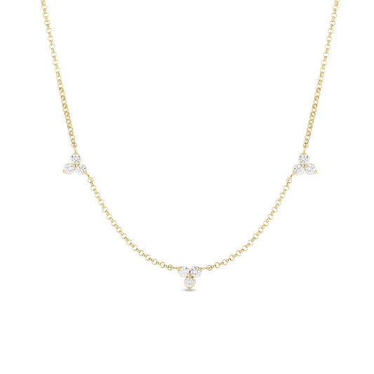 Discover the sophistication of the Roberto Coin Diamonds by the Inch Necklace in 18K Yellow Gold. This exquisite piece features a delicate chain highlighted by three stations, each adorned with clusters of small, round diamonds meticulously crafted for a touch of perfection.