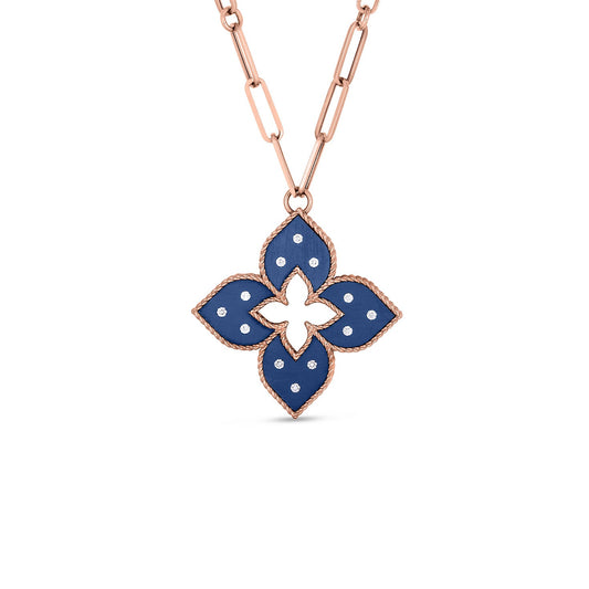 The Roberto Coin Venetian Princess necklace showcases an 18K Rose Gold pendant in the shape of a medium blue titanium flower accented with diamonds. The central cut-out detail enhances its elegance, and it is elegantly attached to a delicate gold chain.