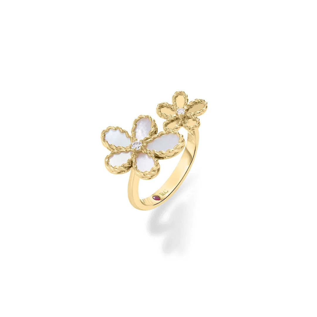 The Roberto Coin Jasmine 18K Yellow Gold Diamond and Mother of Pearl Double Flower Ring features two white petal flower designs with a center gem, displayed on a white background.