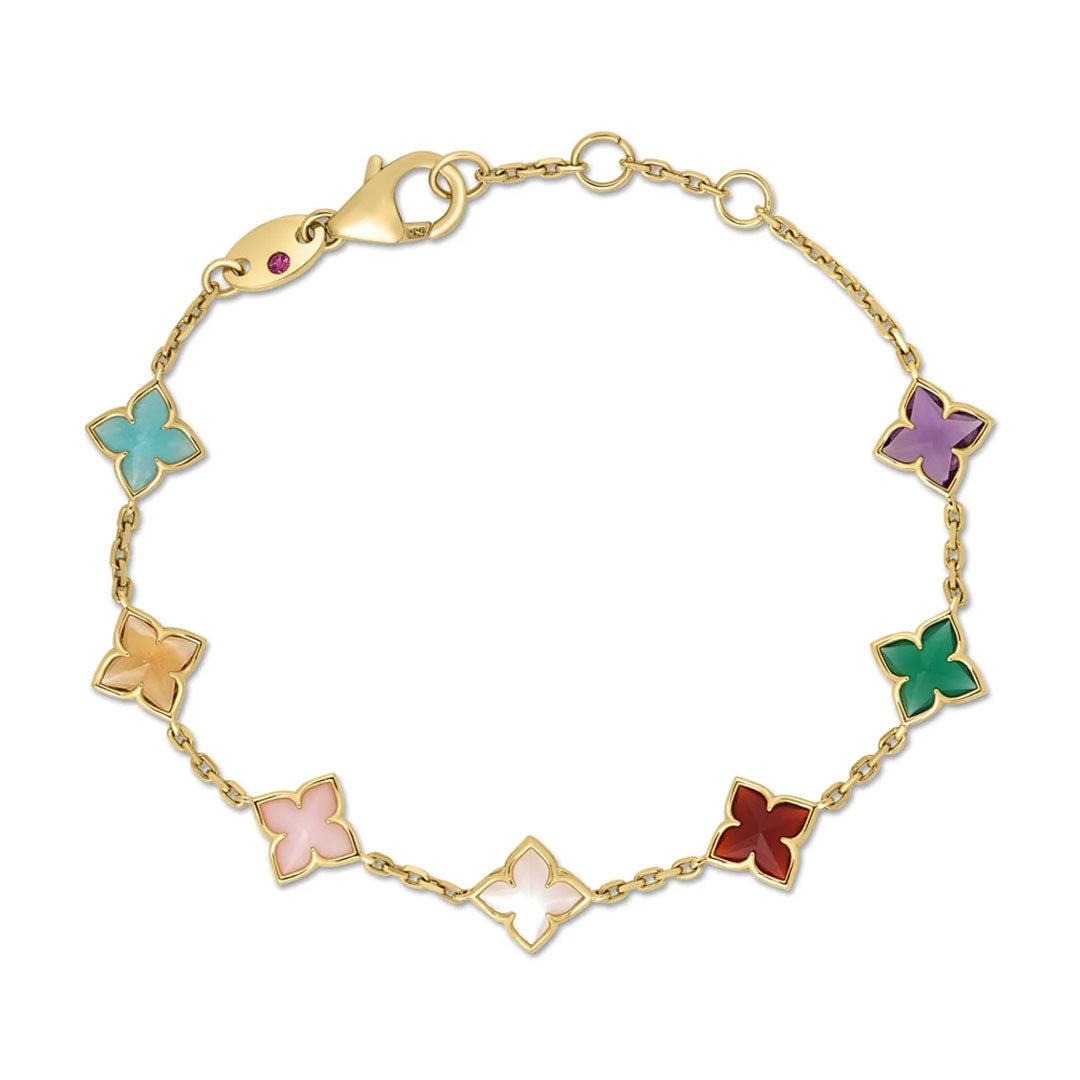 The Roberto Coin Venetian Princess 18K Yellow Gold Carnival Mixed Stones Flower Station Bracelet showcases seven four-petal flower charms, each adorned with vibrant gemstones in light blue, purple, green, red, pink, peach, and orange. This elegant bracelet by Roberto Coin is crafted in delicate 18K gold and finished with a secure lobster clasp.