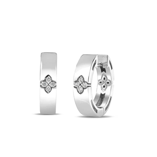 The Roberto Coin Love in Verona 18K White Gold Diamond Small Hoop Earrings feature a four-petal floral motif with diamond accents, a polished finish, and hinged closure for a refined touch.
