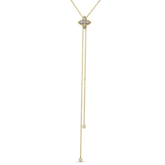 Experience the refined elegance of the Roberto Coin Princess Flower 18K Yellow Gold Pave Diamond Lariat Necklace. This minimalistic piece by Roberto Coin features a stunning four-petal floral motif pendant adorned with sparkling pavé diamonds at its center. Two long, delicate chains extend gracefully from the necklace, each finished with a subtle diamond accent for an exquisitely sophisticated touch.