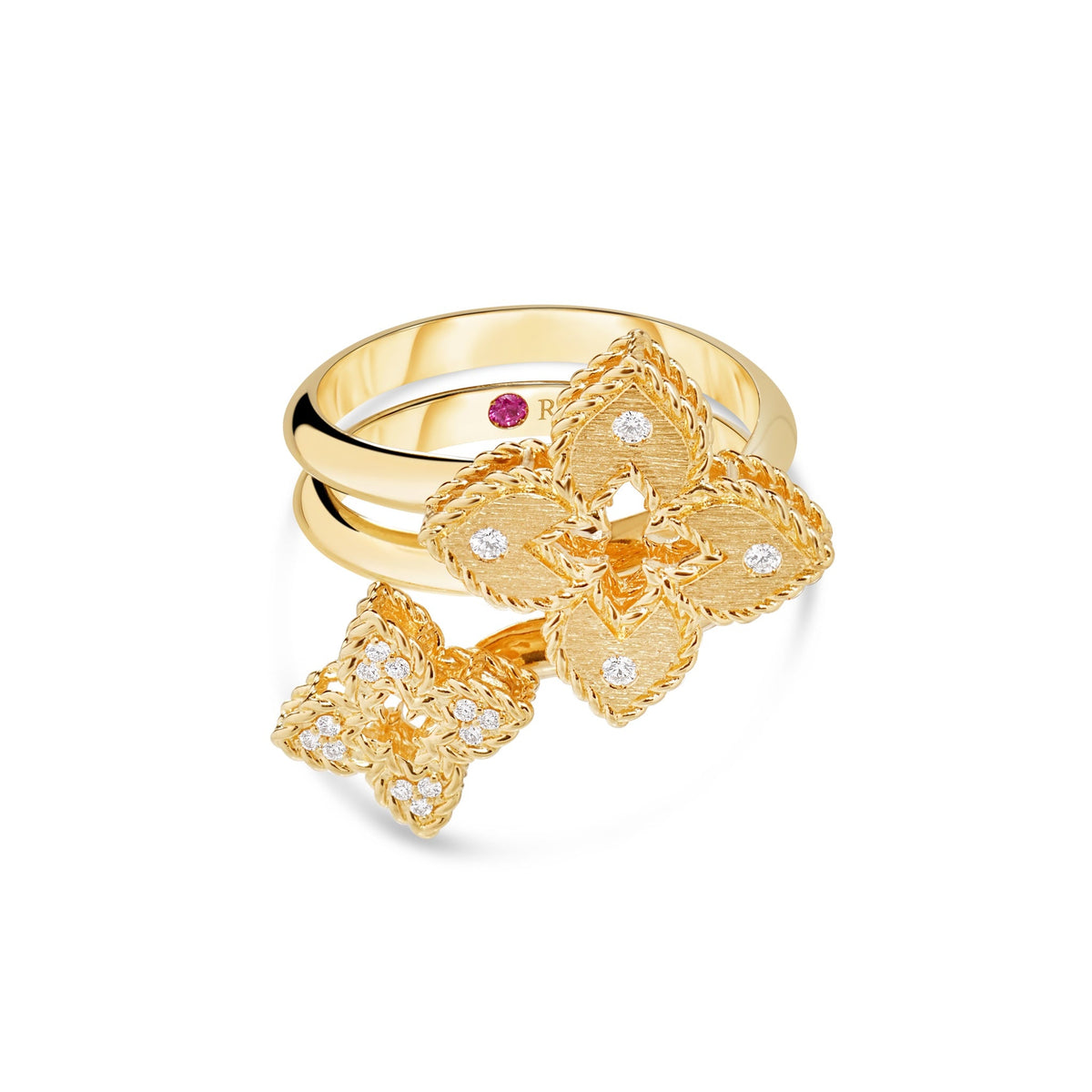 Roberto Coin Venetian Princess 18K Yellow Gold Diamond Ring featuring two floral motifs with pavé diamonds and a small, round pink gemstone set on the inner band.