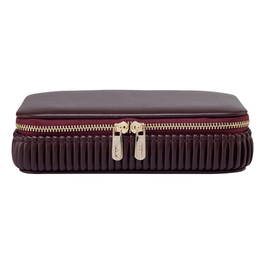 The WOLF 1834 Bella Zip Jewellery Case by WOLF is a rectangular dark burgundy leather organizer with gold double zippers and pleated sides, shown on white. Perfect as a stylish travel jewelry case.