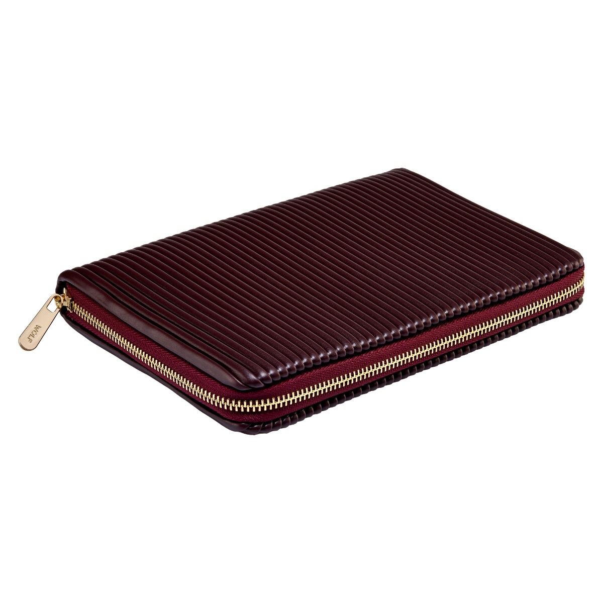 The WOLF 1834 Bella Jewellery Portfolio by WOLF features burgundy ribbed leather and a gold zipper, shown closed and flat on a white background—ideal as a travel jewelry organizer.