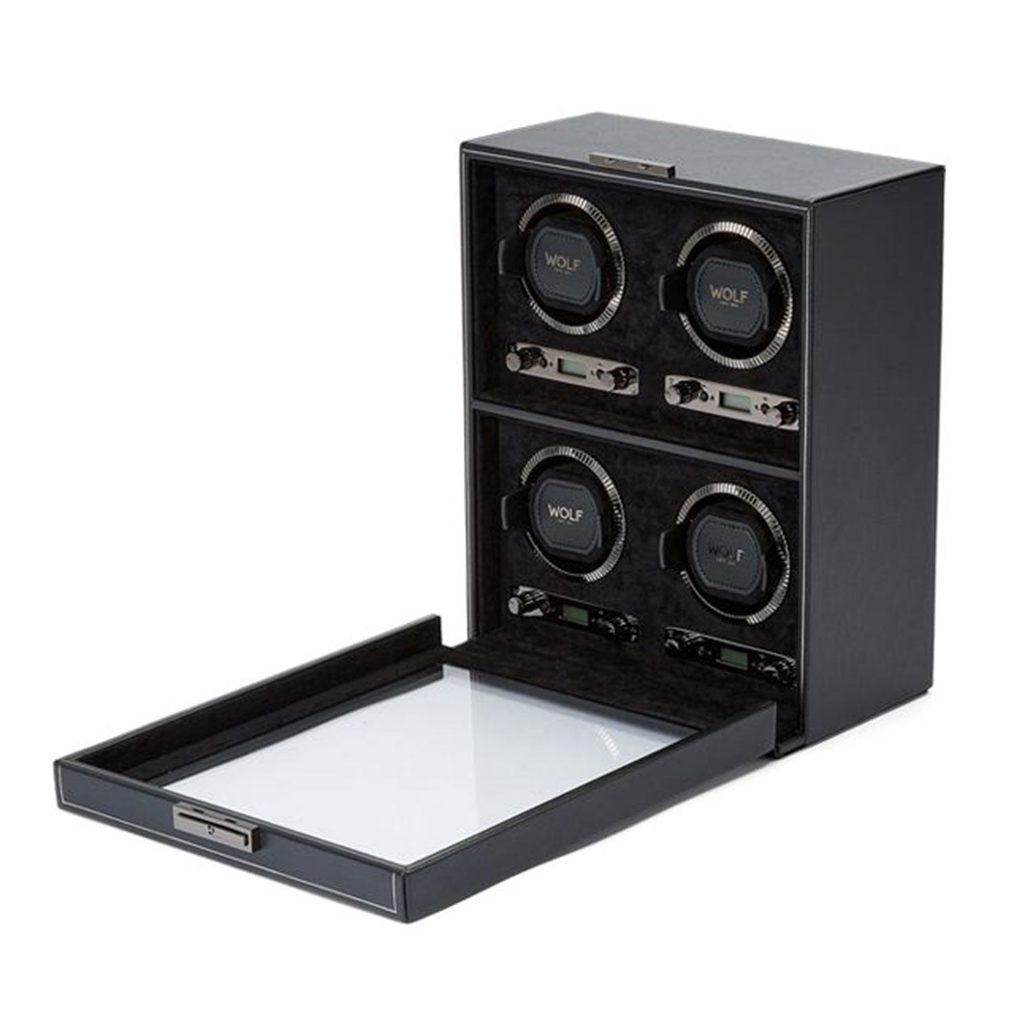 Presenting the WOLF 1834 British Racing 4PC Watch Winder—a classic black accessory that accommodates four watches. The open front panel allows for an elegant display of your collection. Inside, the dark lining complements each slot, which is inscribed with "WOLF" on the inner ring, reflecting the sophistication of British Racing design.