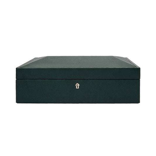 A closed WOLF 1834 British Racing 15 Piece Watch Box, featuring a dark green color and flat top with a small keyhole, graces the plain white background. This elegant watch box is crafted from sleek vegan leather and offers a minimalist design to stylishly store up to 15 pieces of your watch collection.
