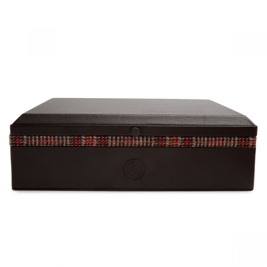 The WOLF 1834 WM Brown Humidor, a closed black box with a textured surface, features a decorative band around the middle with red, pink, and white geometric patterns. This stylish accessory is the perfect choice for the modern man who appreciates fashion-forward design.