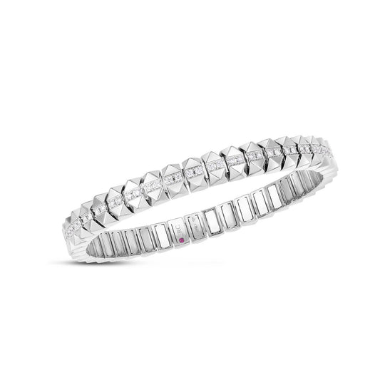 The Roberto Coin 18K White Gold Diamonds Bangle is a sleek piece featuring a minimalist design with geometric square and rectangular shapes. Crafted in 18K white gold, it includes small diamond accents and clean lines, offering a reflective finish ideal for modern elegance.