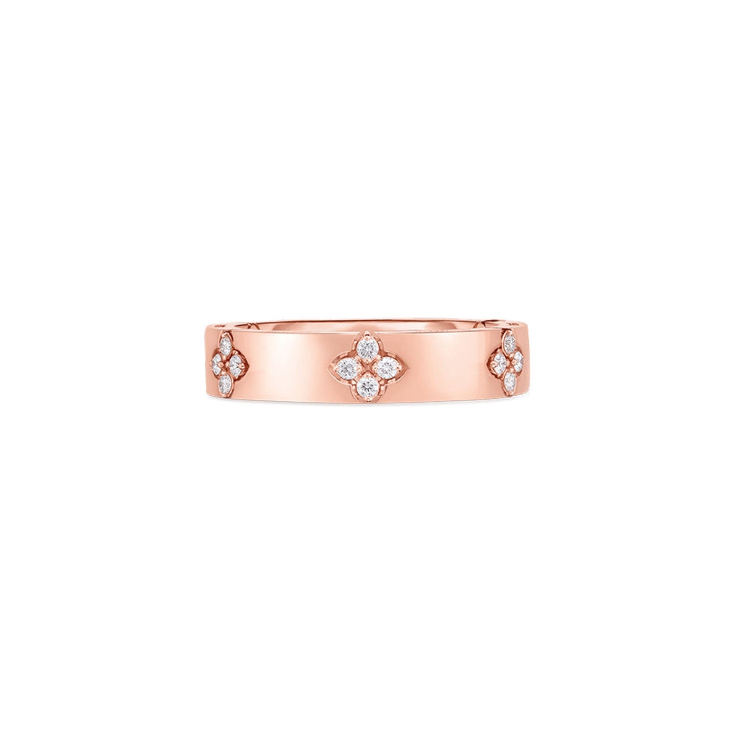 The Roberto Coin Love In Verona 18K Rose Gold Diamond Ring presents a sleek band crafted from 18 Karat Rose Gold, embellished with three diamond clusters. Each cluster contains four round diamonds arranged in a floral design, strategically placed to achieve a refined and lustrous appearance.