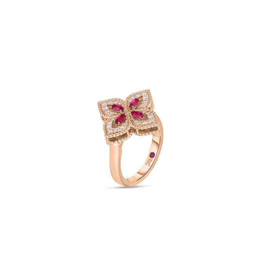 The Roberto Coin Venetian Princess 18K Rose Gold Marquise Ruby And Diamond Ring highlights a butterfly motif embellished with small red gemstones and encircled by white stones. This exquisite piece features intricate patterns and is elegantly set with a marquise ruby at the center.