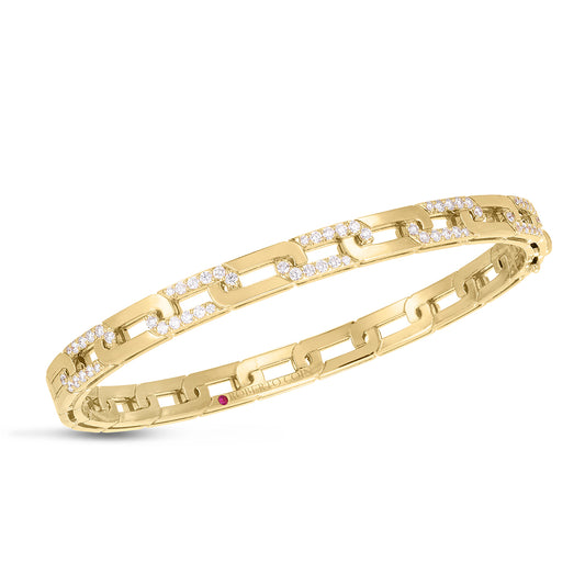 The Roberto Coin Navarra 18K Yellow Gold Diamond Accent Slim Bangle showcases a sophisticated chain-link design, each link adorned with sparkling round diamonds against a pristine white background.