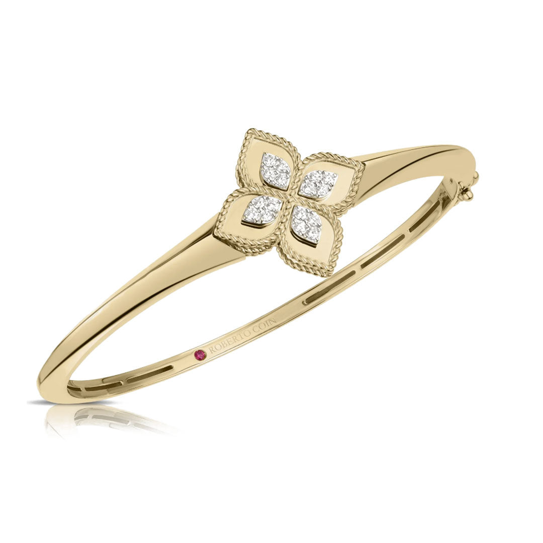 The Roberto Coin Princess Flower 18K Yellow Gold Diamond Knife Edge Bangle features a center diamond-accented four-petal flower with elegant rope detailing on each petal.
