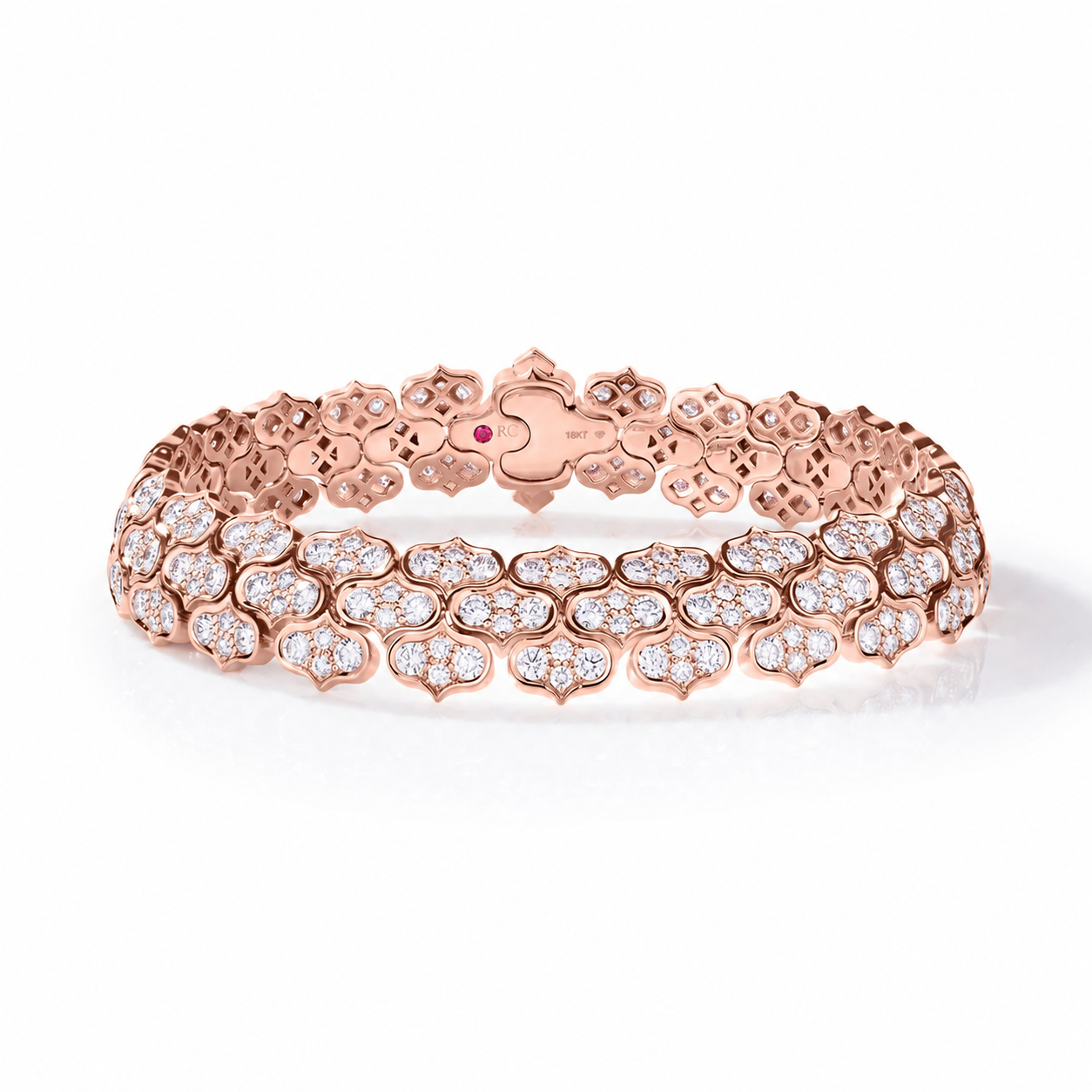 Roberto Coin Cobra 18K Rose Gold Diamond Tennis Bracelet by Roberto Coin, showcasing intricate floral patterns and multiple rows of pavé-set diamonds, elegantly displayed on a white background.