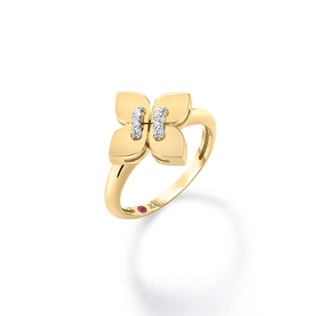 The Roberto Coin Love In Verona 18K Yellow Gold Small Diamond Flower Ring showcases a stylized four-petal design with sparkling diamonds on the center petals—an elegant tribute to love from Roberto Coin.