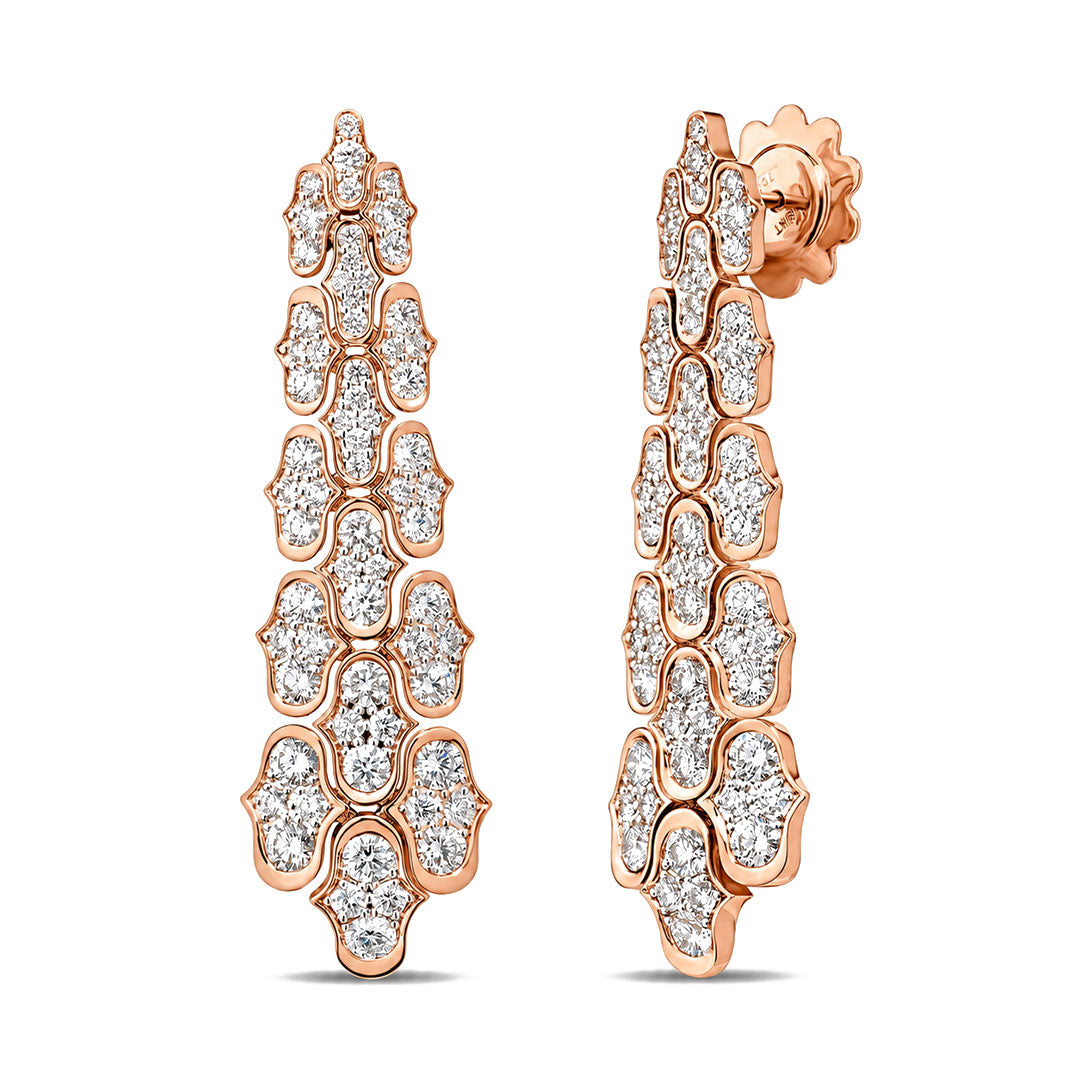 Experience effortless glamour with the Roberto Coin Cobra 18K Rose Gold Diamond Dangle Earrings. Expertly crafted in a tiered, geometric design, these stunning earrings by Roberto Coin showcase clusters of sparkling white diamonds arranged in mesmerizing, repeating patterns for an elegant and eye-catching effect.