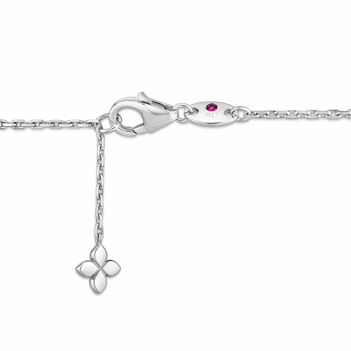 Roberto Coin 18K White Gold Diamond Necklace featuring a lobster claw clasp, a round ruby inlay, and a four-petal flower charm on an adjustable extender chain.