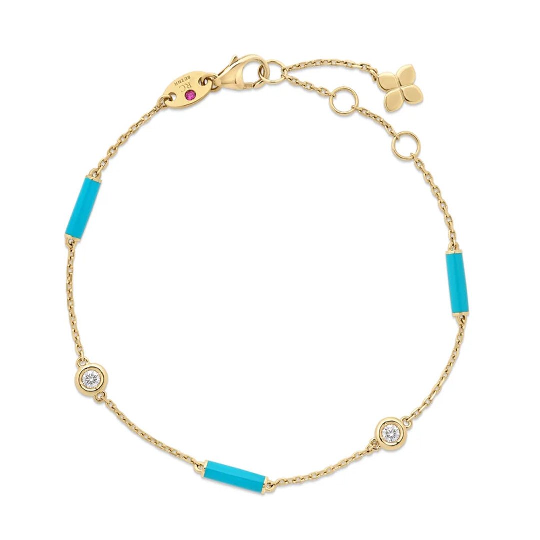 The Roberto Coin Diamonds by the Inch 18K Yellow Gold Turquoise Enamel Bar and Diamond Bezel Station Bracelet features delicate turquoise enamel bar accents, sparkling bezel-set diamonds, and is crafted in luminous 18K yellow gold.