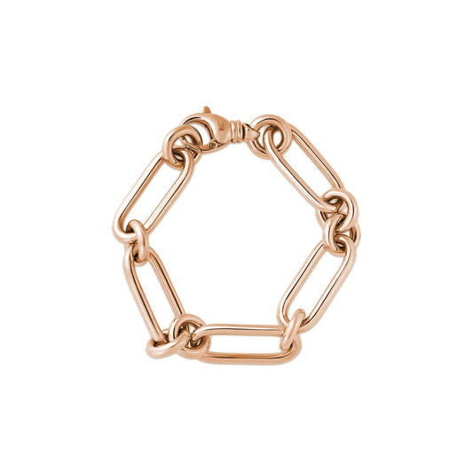 The Roberto Coin 18K Rose Gold Bracelet showcases a series of large, interlocking oval links arranged in a circular pattern and secured with a clasp at the top. The design is both simple and elegant, emphasizing the smooth texture and warm luxury of the 18K rose gold metal.