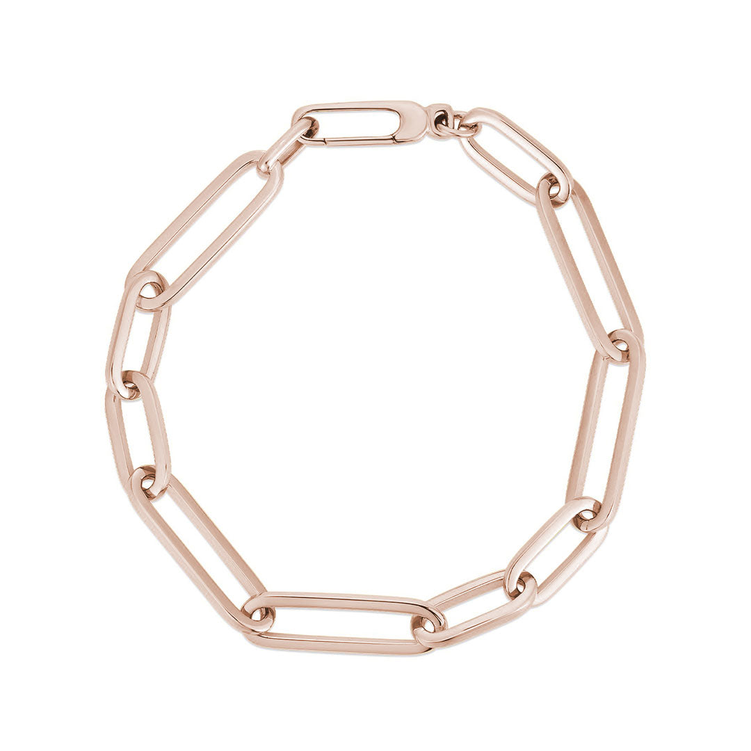The Roberto Coin Designer 18K Rose Gold Alternating Fluted Paperclip & Oval Link Bracelet is a stunning piece crafted in 18K rose gold. It features elongated, interlocking links with a clasp, and its simple yet elegant design boasts a polished finish, beautifully displayed on a white background.