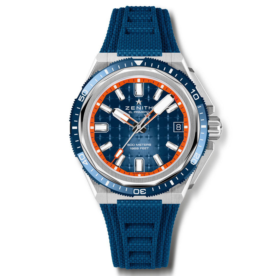 The ZENITH Defy Extreme Diver El Primero 3620 Automatic Chronograph 42.5mm Watch by Zenith showcases a blue face with orange accents and a blue fabric strap. It includes silver markers, hands, a date display, and "500 meters / 1650 feet." Its robust design is completed with a titanium case and an eye-catching blue and silver bezel.