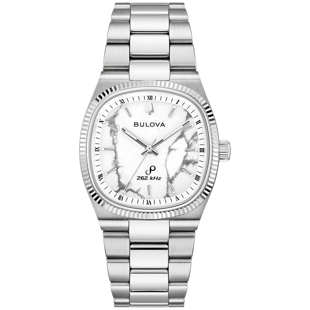 Bulova Super Seville Precisionist Quartz 35mm Watch in silver-tone with a white marble-patterned dial, fluted bezel, and stainless steel link bracelet.