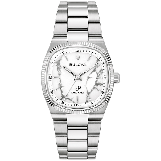 Bulova Super Seville Precisionist Quartz 35mm Watch in silver-tone with a white marble-patterned dial, fluted bezel, and stainless steel link bracelet.