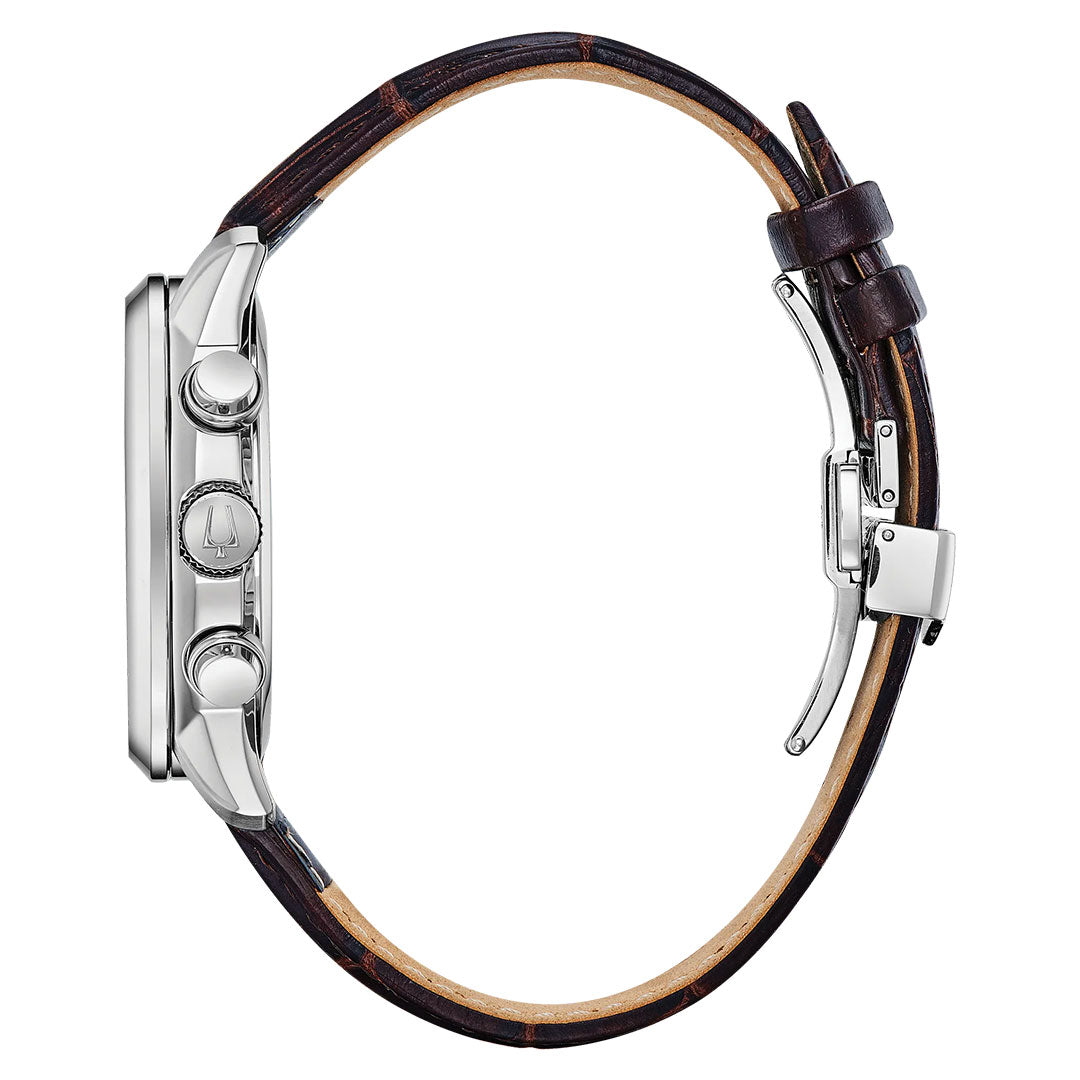 A side view of the Bulova Sutton Classic Quartz 44mm Watch by Bulova, showing a brown leather strap with silver clasp and three buttons on the metal case. The strap is fastened, and the watch face is not shown.