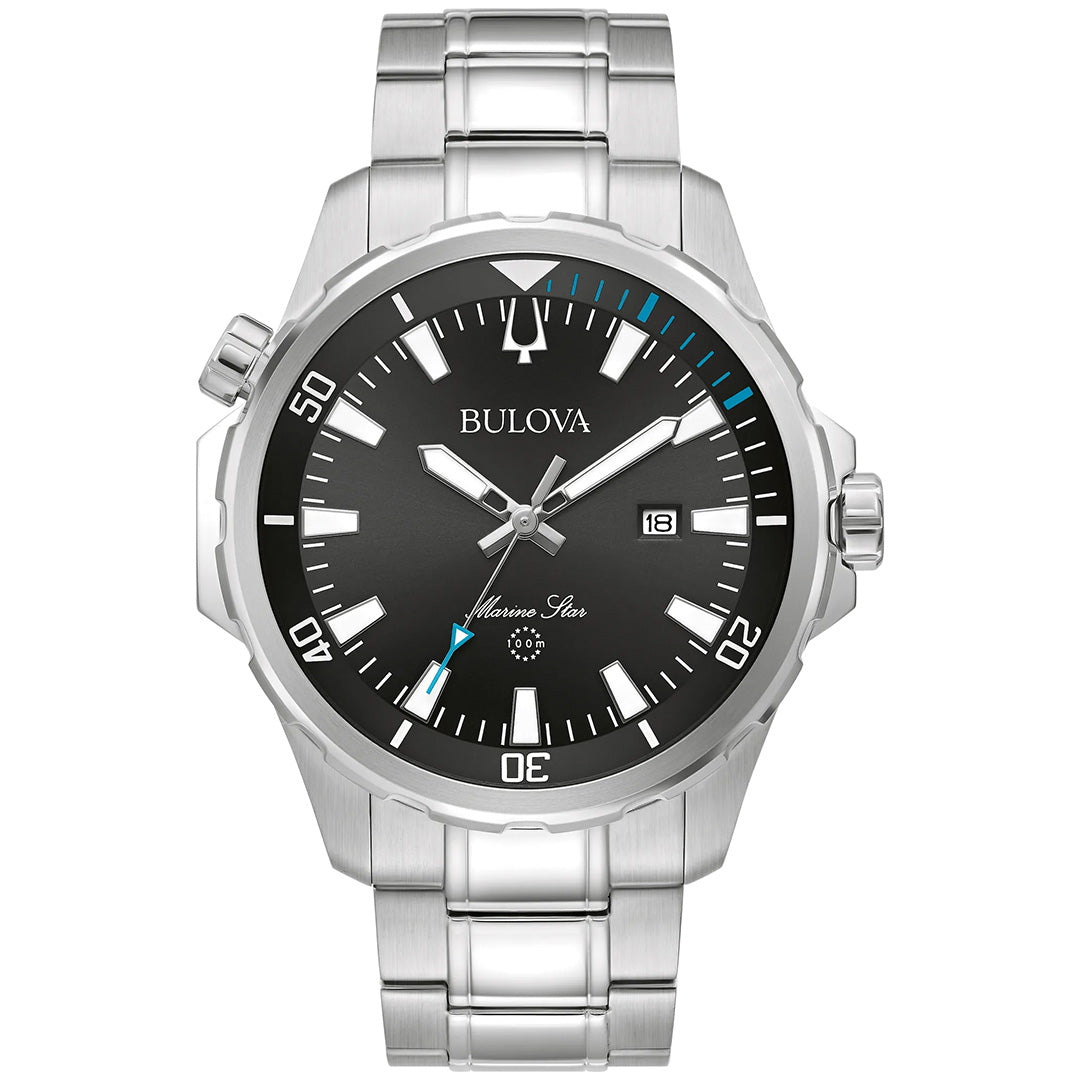 This striking men’s watch is the Bulova Marine Star Series B Quartz 44mm, featuring a black dial with white hour markers, date display at 3 o’clock, and a stainless steel bracelet. Blue accents on the second hand and minute markers emphasize its distinctive Marine Star design.