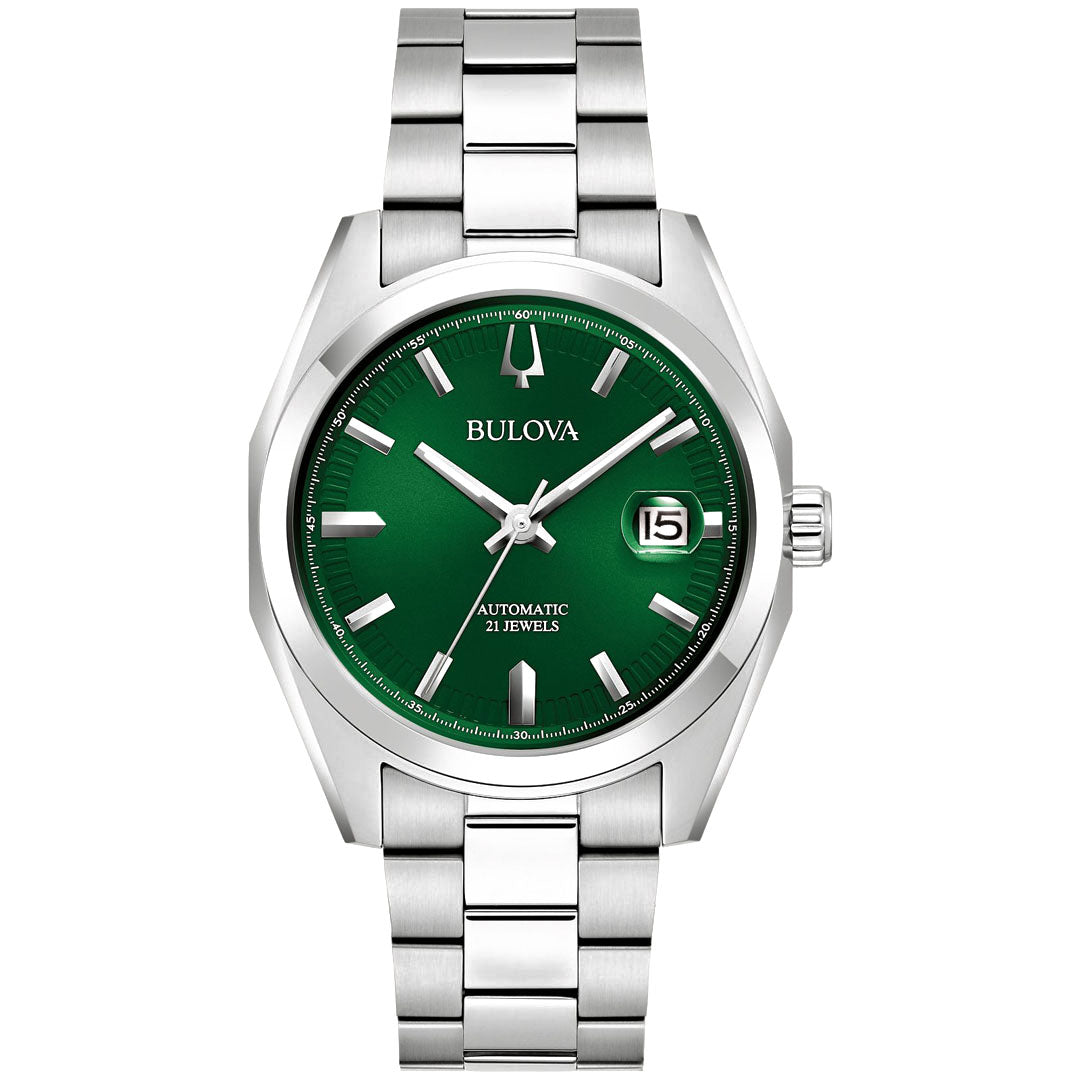 The Bulova Surveyor Automatic 39mm Watch for men showcases a green dial with the time set at 10:09, highlighted by silver hour markers and a date window positioned at the 3 o’clock mark. The words "Automatic 21 Jewels" are elegantly displayed on the dial, which is elegantly complemented by a stainless steel bracelet.