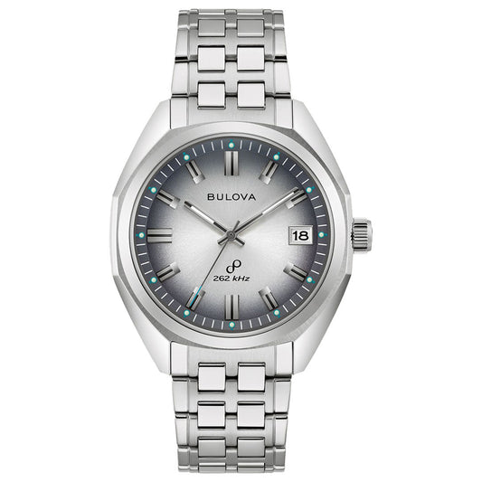 The Bulova Jet Star Quartz 40mm Watch features a stainless steel bracelet, gray gradient dial with silver hour markers, turquoise minute dots, a date window at 3 o’clock, and “262 kHz” text above 6 o’clock.