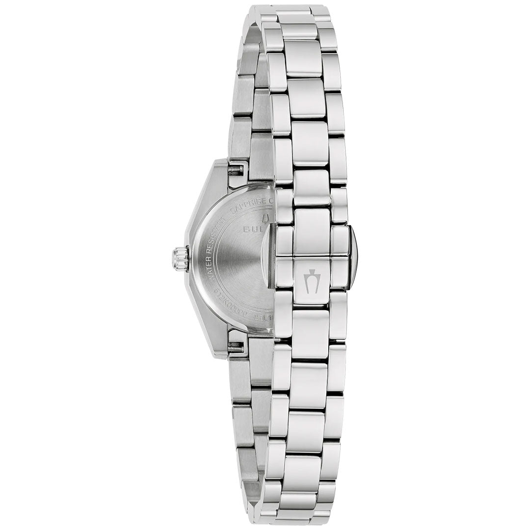 A Bulova Surveyor Quartz 23mm Watch in silver-tone stainless steel, shown from the back with its clasp and linked bracelet featuring the crown logo, highlighting the circular case and back—a classic ladies’ design by Bulova.