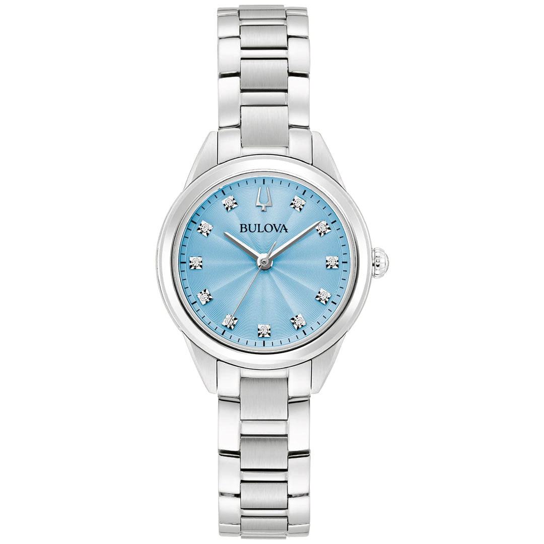 The Bulova Sutton Quartz 28mm Watch for ladies features a stainless steel bracelet and a light blue dial. This elegant timepiece is adorned with silver hour markers embellished with small crystals, complemented by silver-toned hands, making it a modern masterpiece.