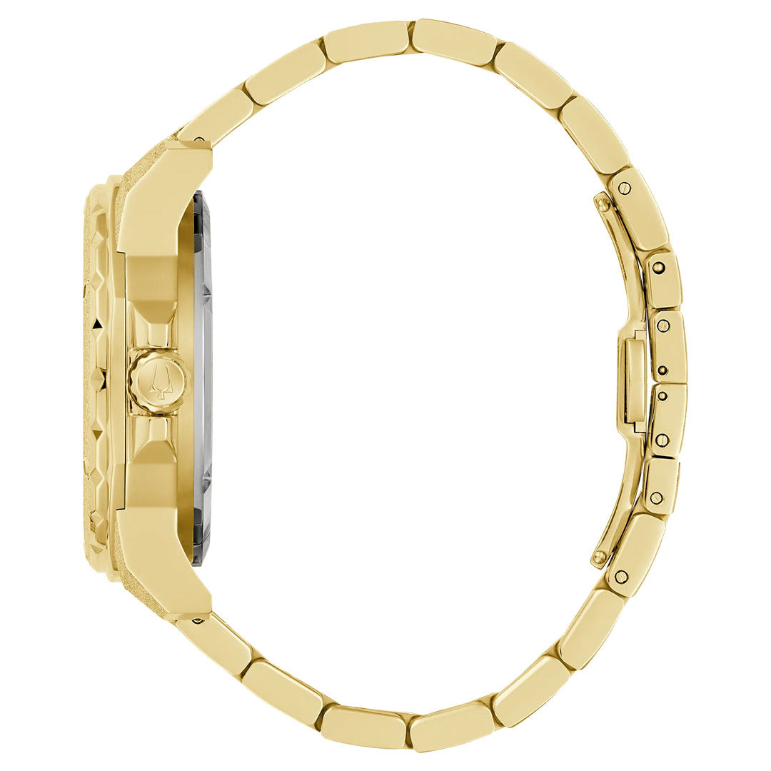 Side view of the Bulova Marine Star Marc Anthony Automatic 44mm men’s watch, showcasing its gold-tone metal link band, prominent crown, case thickness, and secure clasp.