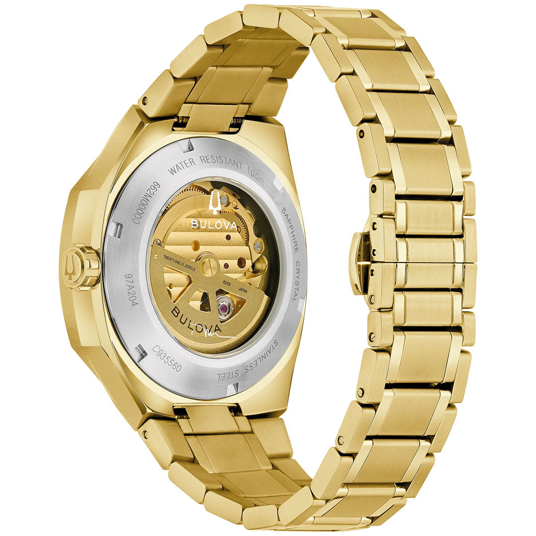 Close-up of the back of the Bulova Surveyor Marc Anthony Automatic 40.5mm Watch, showcasing its gold-tone stainless steel bracelet, robust stainless steel case, and an exposed automatic movement visible through the transparent case back.