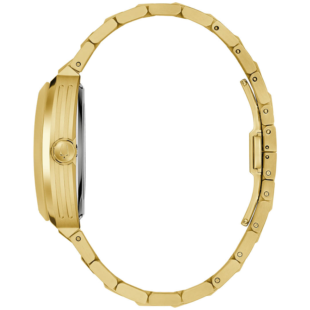 The Bulova Maquina Automatic 40mm Watch is shown from the side, highlighting its slim profile, textured gold-tone stainless steel case, and linked bracelet strap with a clasp.