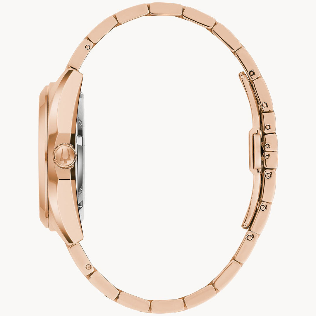 Side view of the Bulova Surveyor Automatic 39mm men's watch in rose gold-tone stainless steel with a metal link bracelet, round case, crown, and clasp, showcased on a white background.