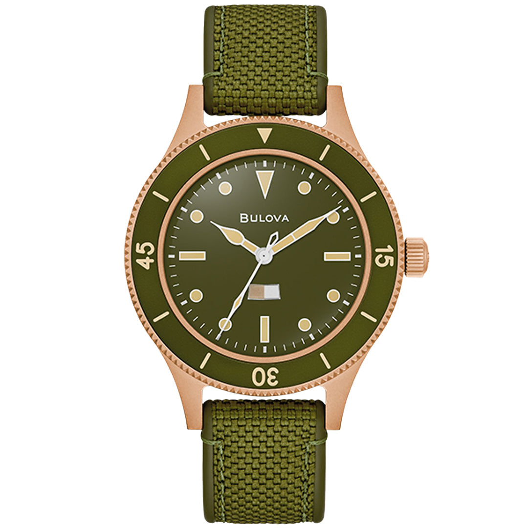 The Bulova Mil Ships Automatic 41mm Watch honors Bulova's 150th Anniversary with a green face, a braided fabric strap, and a rose gold casing. It features large white numerals, three hands, and a date window at 4 o'clock, reflecting the timeless style of MIL-SHIPS Bronze designs.