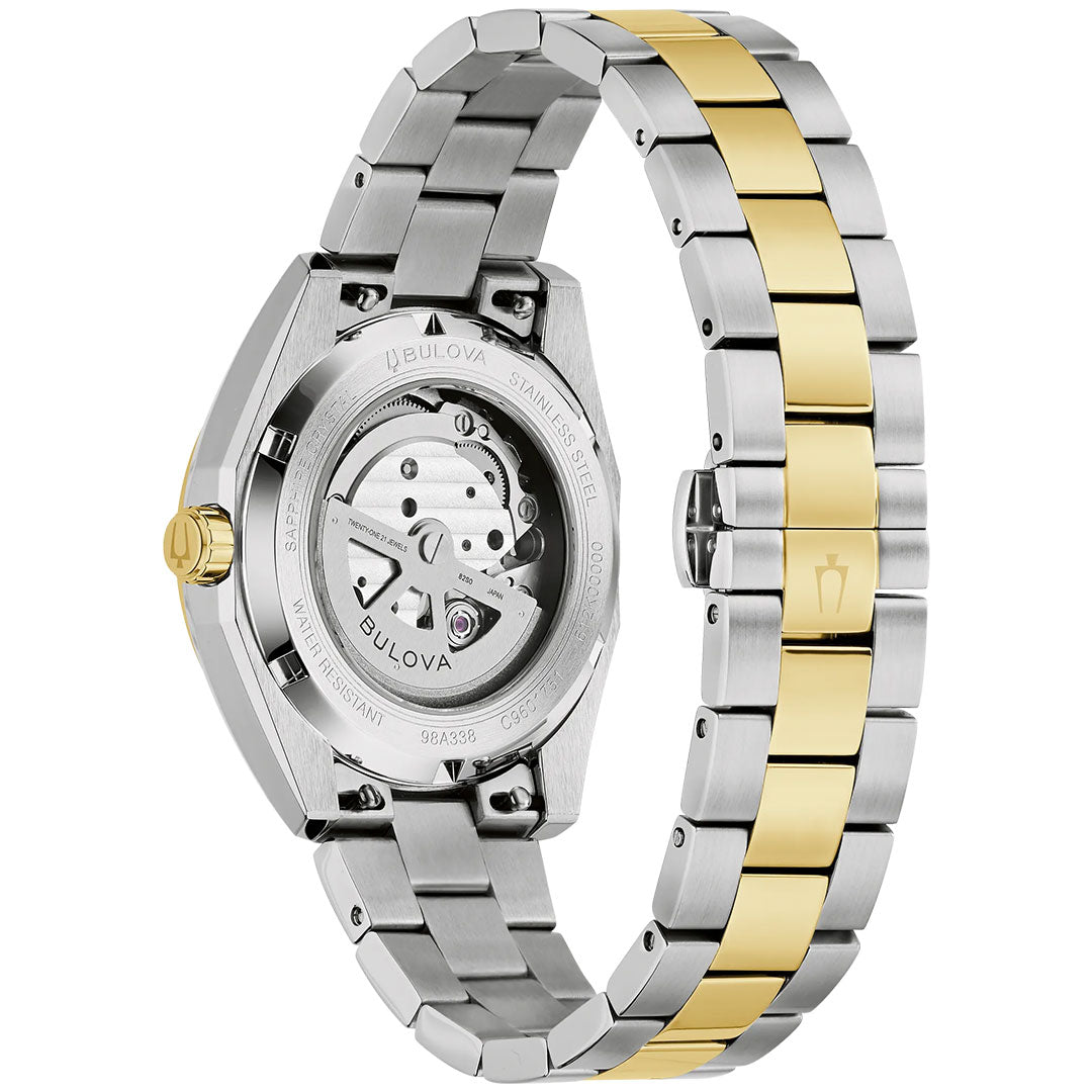 The back view of the Bulova Surveyor Automatic 39mm Watch showcases its intricate movement through a transparent case back, featuring a stainless steel and gold two-tone band.
