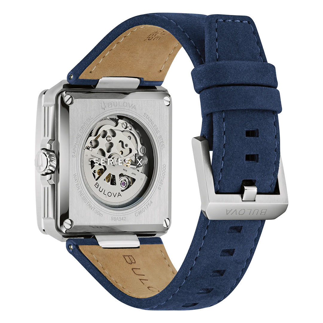 A Bulova Series X Automatic 41mm men’s watch in silver, featuring a visible skeletonized automatic movement and a blue suede strap, displayed from the back to showcase its transparent caseback—a striking example of luxury watchmaking by Bulova.