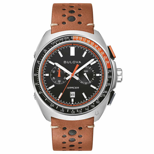 Presenting the Bulova Racer Quartz 42mm Watch: A stylish wristwatch from Bulova featuring a black dial with white and orange accents and a tachymeter. This watch exudes an automotive aesthetic with its brown perforated racing-style leather strap, three subdials, and a date display positioned at 6 o'clock.