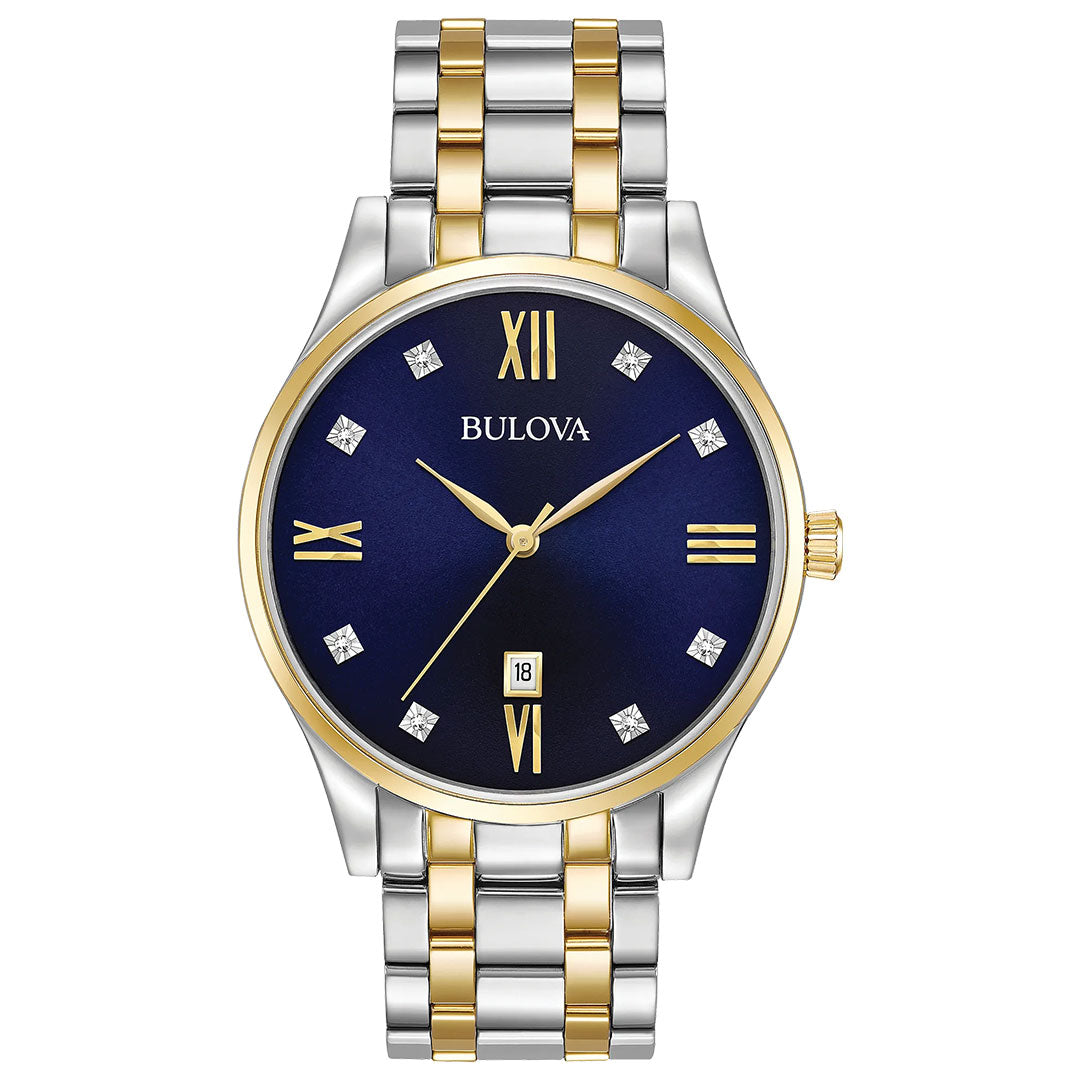 The Bulova Classic Diamond Quartz 40mm Watch features a diamond blue dial, gold Roman numeral and diamond markers, a two-tone silver and gold stainless steel band, and a date window above the 6 o’clock position.