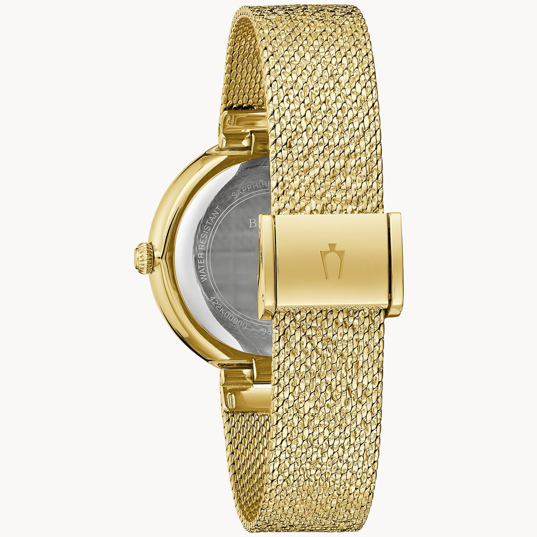 The Bulova Crystal Quartz 32mm Watch is gold-tone stainless steel with a mesh strap, round case, and an arrow-engraved clasp. The back details its water resistance, while the front features a champagne dial adorned with Austrian crystals.