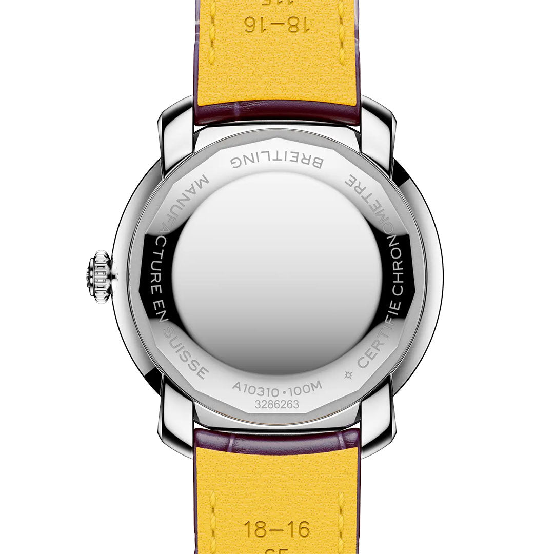 The back of the BREITLING Lady Premier Automatic 36 shows engraved details on its stainless steel case and yellow leather strap, with the crown on the left. The watch face is hidden from view in this women’s chronograph by Breitling.